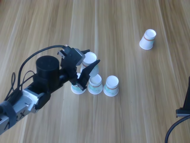 Paper-cup stacking, chronological frame 4 of 6 from Figure 13.