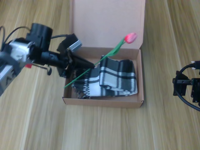 Box packing and closing, chronological frame 4 of 6 from Figure 11.